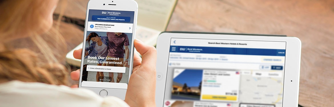 woman looking at phone with the BW To Go App displaying