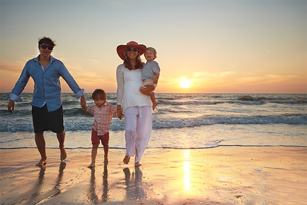 family enjoying the beach