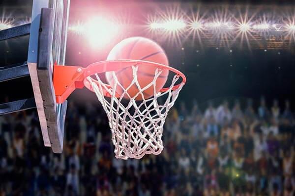 Basketball going in the net in Kansas