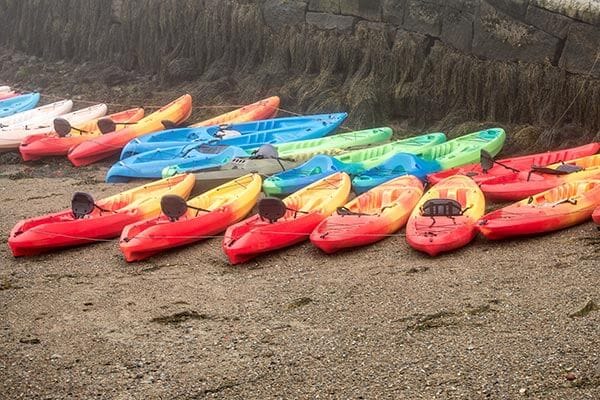 Kayaks on riverbank in Virginia