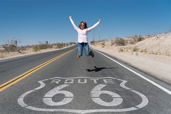 woman jumping on Route 66