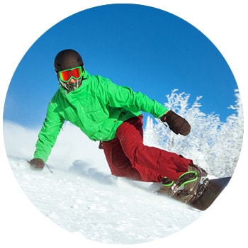 Snowboarder carving on fresh snow