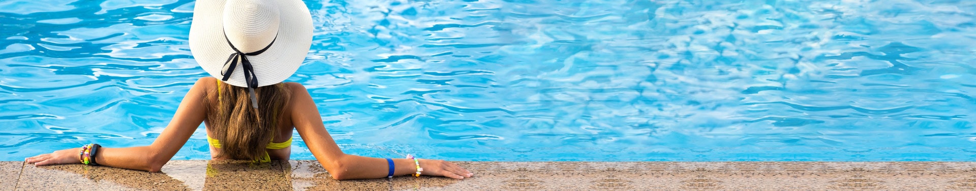 Woman enjoying the resort pool