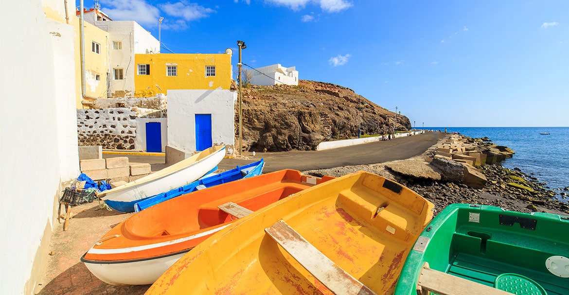 Boats along coastline in Greece