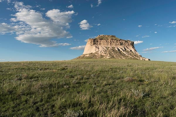 small mountain and grassland