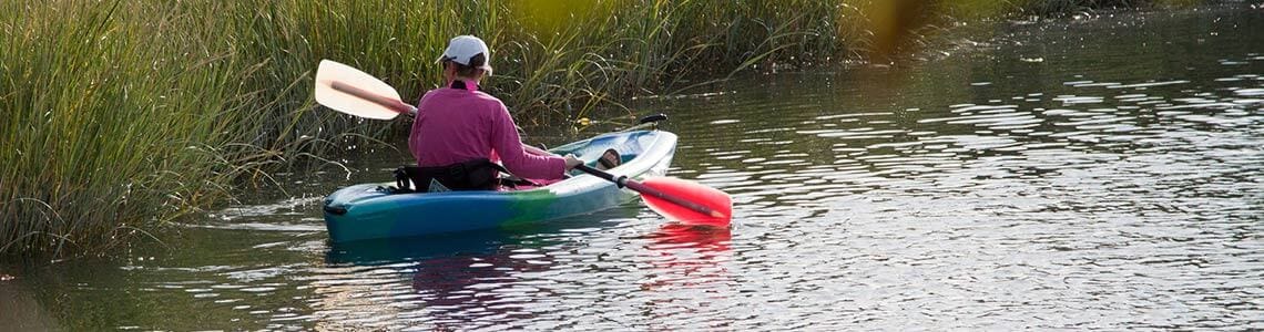 Woman kayaking in a Connecticut State Park
